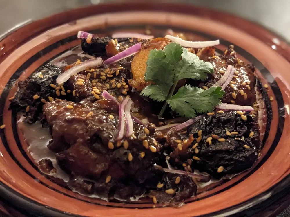 Tajine de Chapon Pruneaux Et Amandes